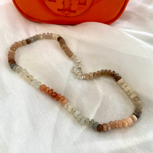 Hand-knotted candy choker necklace featuring 6mm faceted moonstone, labradorite, and sunstone beads, with a sterling silver marine clasp. The necklace measures 16 inches and offers a colorful and elegant design.