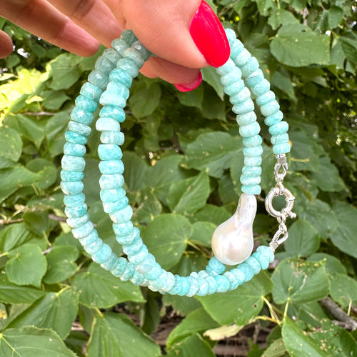 Fabulous greenish blue Amazonite faceted rondelle shape beads 5-6mm enhanced with a freshwater baroque pearl and finished with sterling silver marine closure. This necklace can make a perfect gift for March birthday ladies.
Measures 16,5