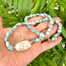 Load image into Gallery viewer, Fall in love with the soothing blues of Larimar and the timeless elegance of baroque pearls! This necklace features dreamy, ocean-inspired Larimar gemstones nuggets, perfectly complemented by the organic beauty of a stunning baroque pearl, 18 inches
