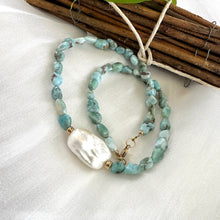 Load image into Gallery viewer, Fall in love with the soothing blues of Larimar and the timeless elegance of baroque pearls! This necklace features dreamy, ocean-inspired Larimar gemstones nuggets, perfectly complemented by the organic beauty of a stunning baroque pearl, 18 inches
