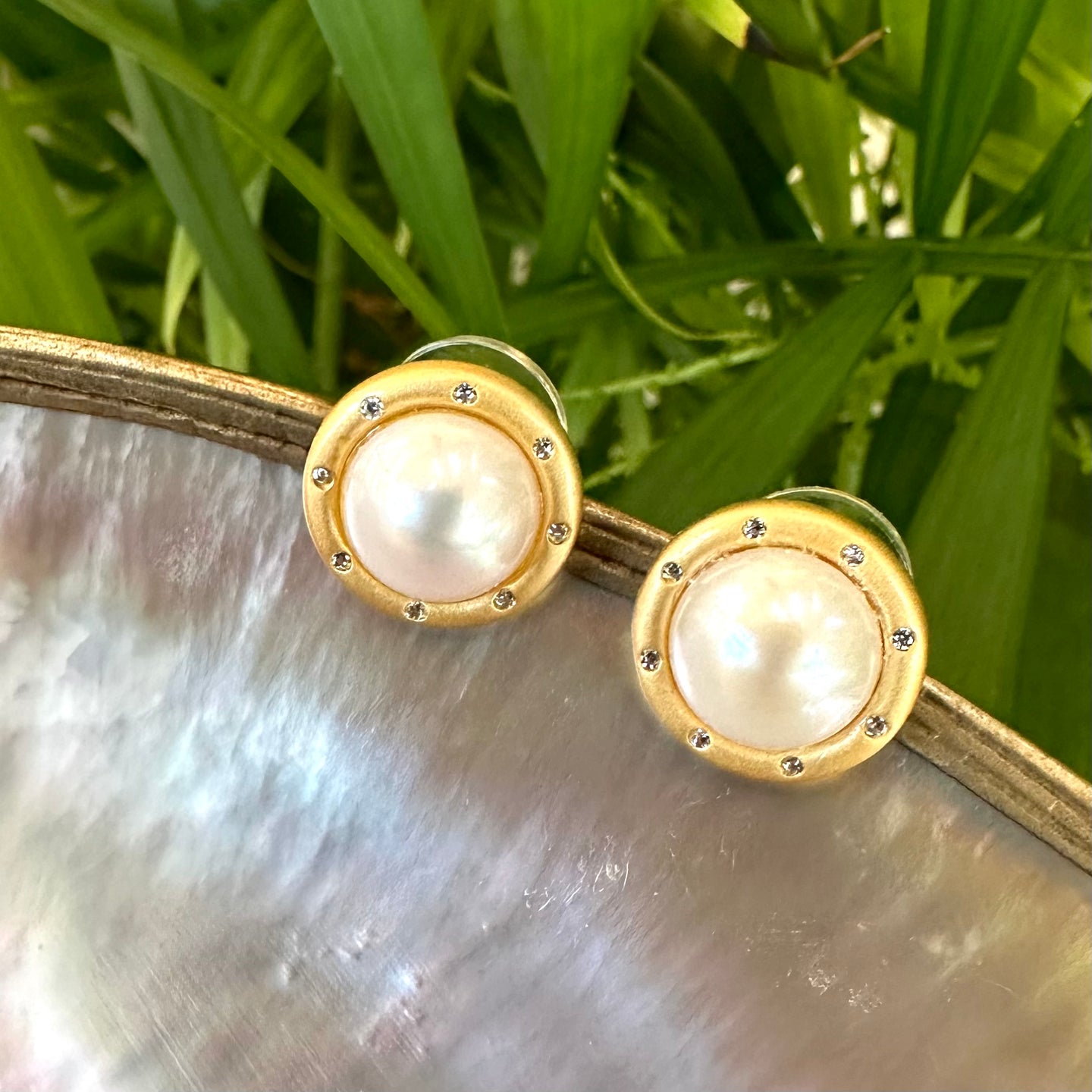 White Edison Mabe Pearl stud earrings with CZ accents in gold vermeil-plated silver, ideal for bridal jewelry and special occasions.