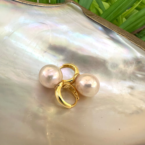 Light golden pink Edison pearl drop earrings with 13mm pearls on gold vermeil-plated silver huggie hoops, perfect for a June birthday or elegant gift.