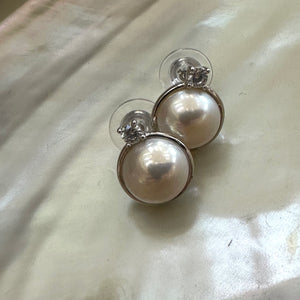 White Mabe Edison pearl stud earrings with CZ accents, set in sterling silver, minimalist and elegant, perfect for bridal jewelry or a special gift.