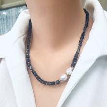 Load image into Gallery viewer, Navy Blue Iolite Rectangular Beads and 2 Baroque Pearls off centre Necklace. Finished with sterling silver details, this necklace brings together luxury and durability. The adjustable length, ranging from 19 to 20 inches, ensures a perfect fit
