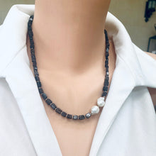 Load image into Gallery viewer, Navy Blue Iolite Rectangular Beads and 2 Baroque Pearls off centre Necklace. Finished with sterling silver details, this necklace brings together luxury and durability. The adjustable length, ranging from 19 to 20 inches, ensures a perfect fit
