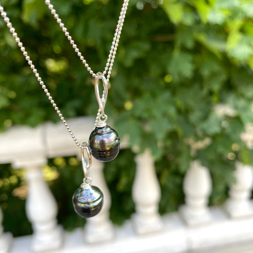 Black Tahitian teardrop pearl pendant on a sterling silver ball chain, available in 20 or 22 inches. This elegant handmade jewelry piece is a perfect June birthstone gift for her.